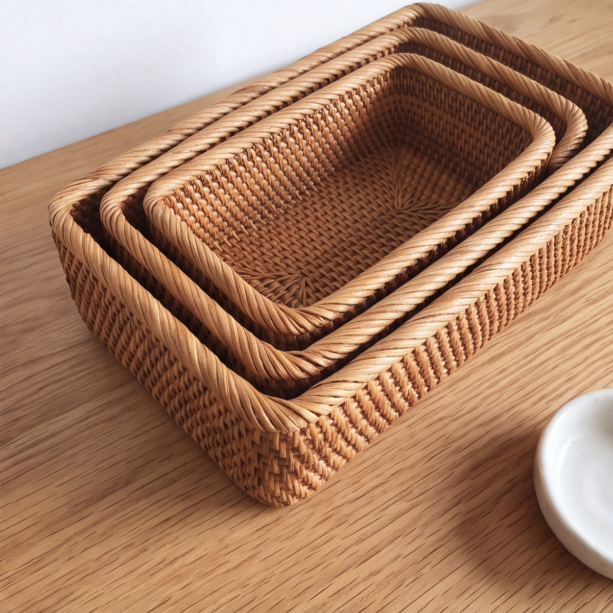The Rattan Trays, three rattan trays shown to scale