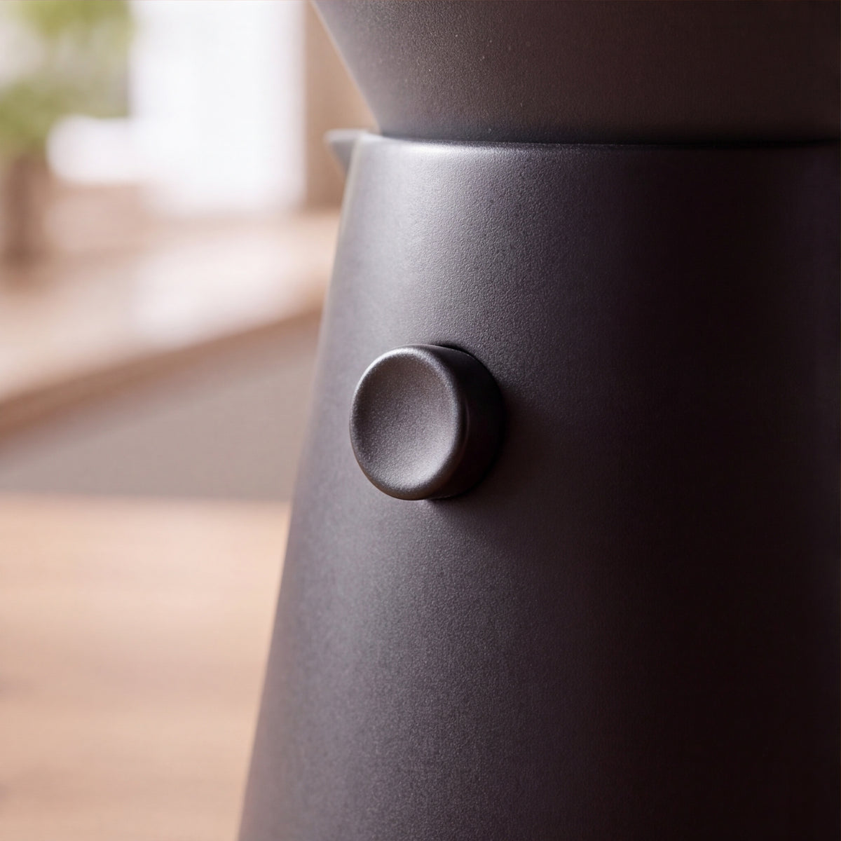 Close-up of the matte black ceramic carafe from The Pour-Over Set